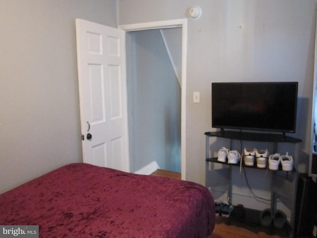 bedroom featuring hardwood / wood-style floors