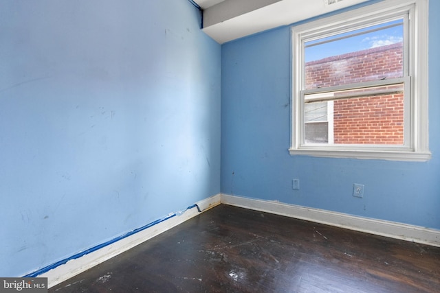 spare room featuring plenty of natural light