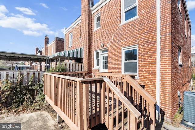 wooden terrace with central AC unit