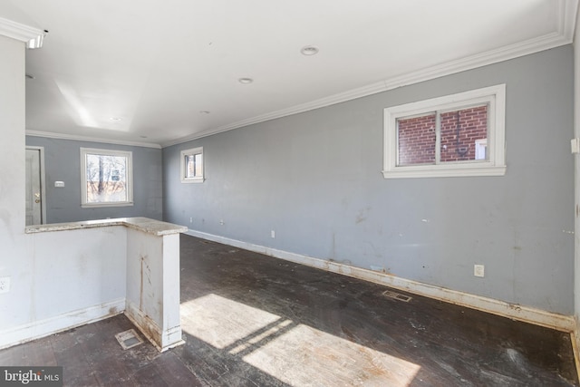 unfurnished room with crown molding and dark wood-type flooring