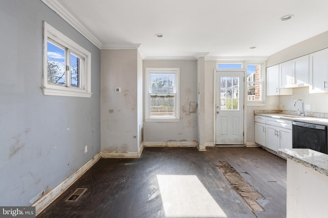 kitchen with a healthy amount of sunlight, black dishwasher, white cabinetry, and dark wood-type flooring