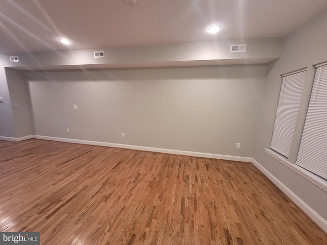 basement featuring light wood-type flooring