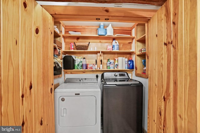 laundry room with washing machine and clothes dryer