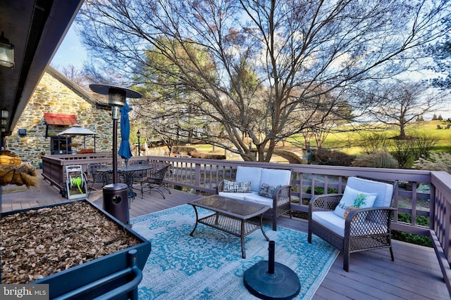 deck featuring an outdoor hangout area