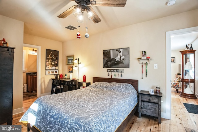 bedroom featuring hardwood / wood-style flooring and ceiling fan