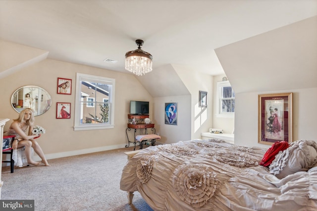 bedroom with carpet flooring, a chandelier, and lofted ceiling