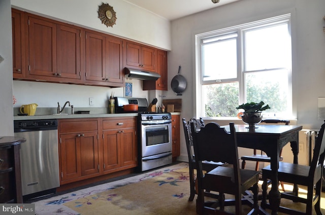 kitchen with appliances with stainless steel finishes and sink