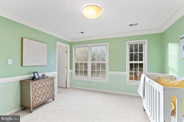 carpeted bedroom featuring ornamental molding