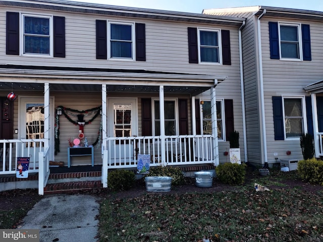 multi unit property featuring covered porch