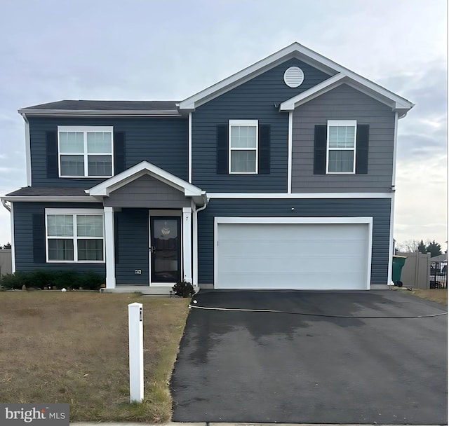 view of property with a garage