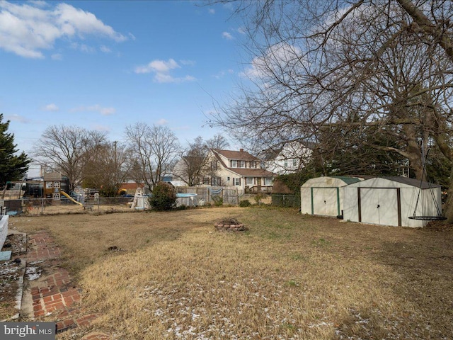 view of yard featuring a storage shed