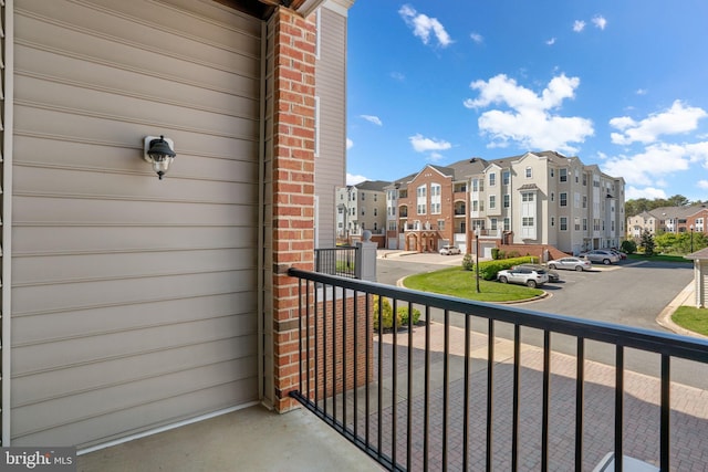 balcony featuring a residential view