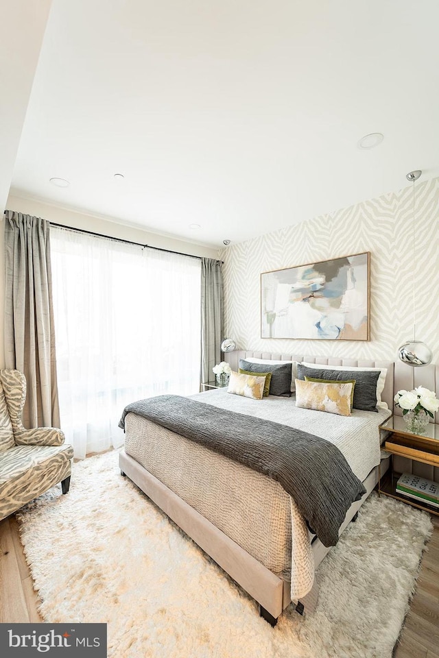 bedroom featuring hardwood / wood-style floors