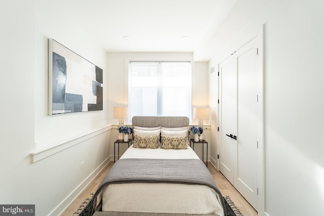 bedroom featuring light hardwood / wood-style flooring