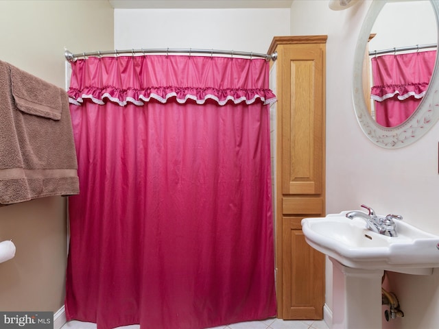 bathroom featuring tile patterned flooring