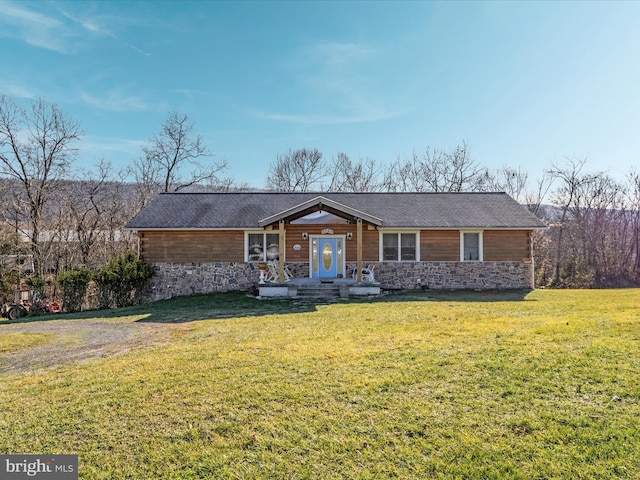 single story home featuring a front yard