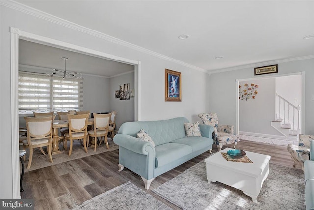 living room featuring crown molding and dark hardwood / wood-style floors