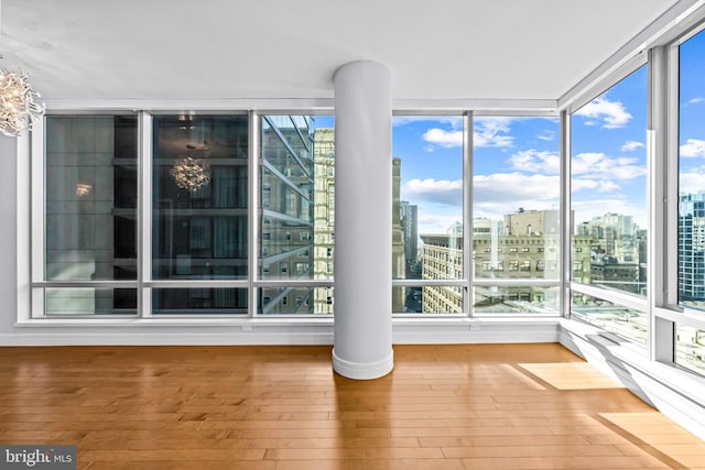 unfurnished sunroom with a healthy amount of sunlight