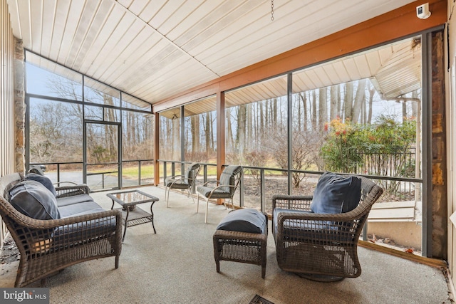 sunroom with lofted ceiling