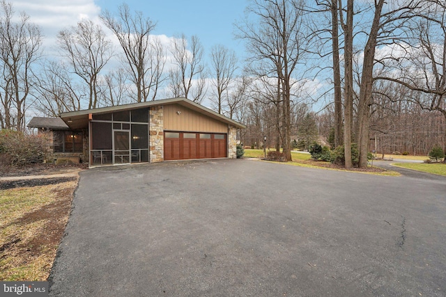 view of property exterior featuring a garage