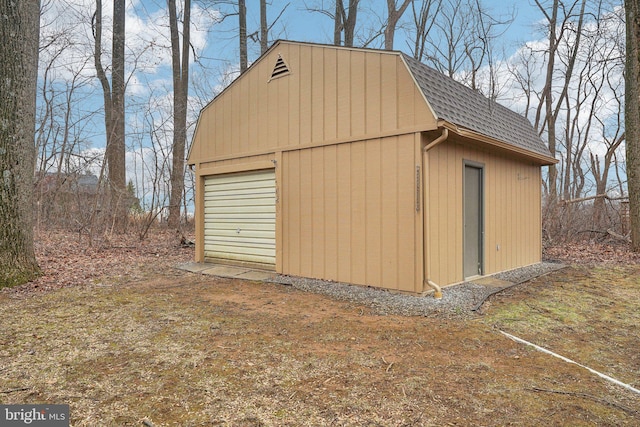 view of outdoor structure featuring a garage