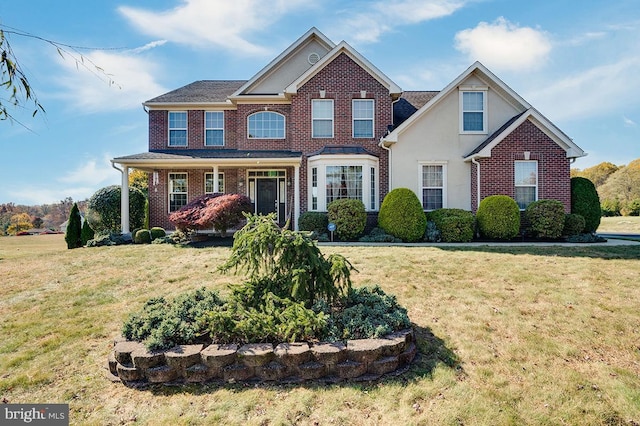 view of front of house featuring a front lawn