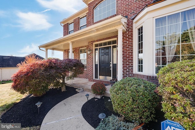 entrance to property with a porch