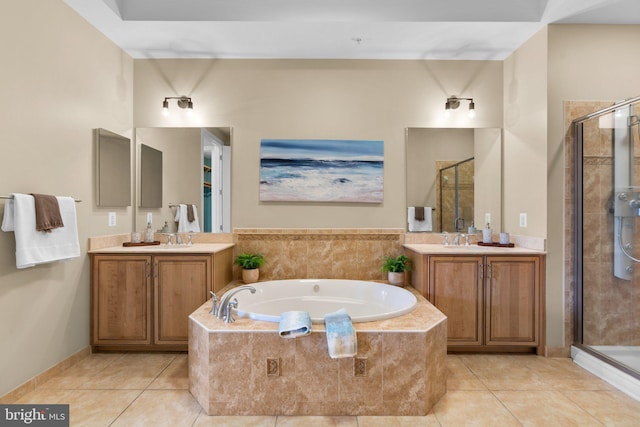 1915 Towne Centre Blvd Unit 502, Annapolis, MD 21401 - bathroom with a stall shower, a bath, two vanities, and tile patterned flooring