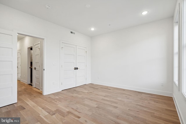 unfurnished bedroom featuring light hardwood / wood-style flooring