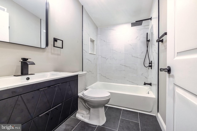 full bathroom featuring toilet, vanity, tiled shower / bath combo, and tile patterned floors