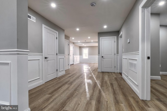 hallway featuring wood-type flooring