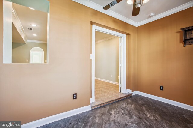 unfurnished room with ceiling fan, wood-type flooring, and ornamental molding