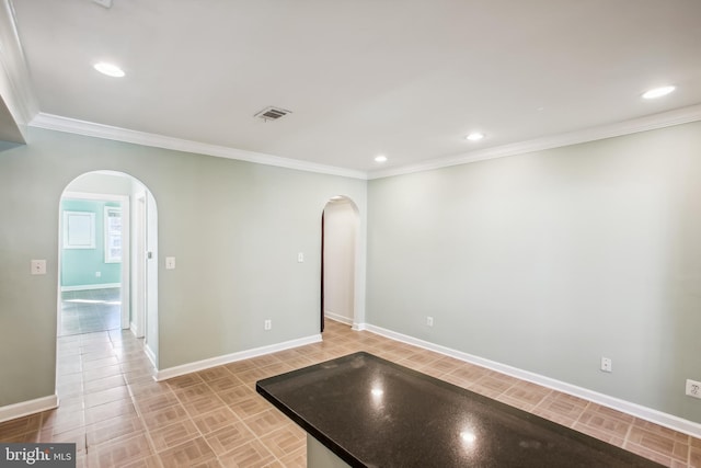 kitchen featuring crown molding