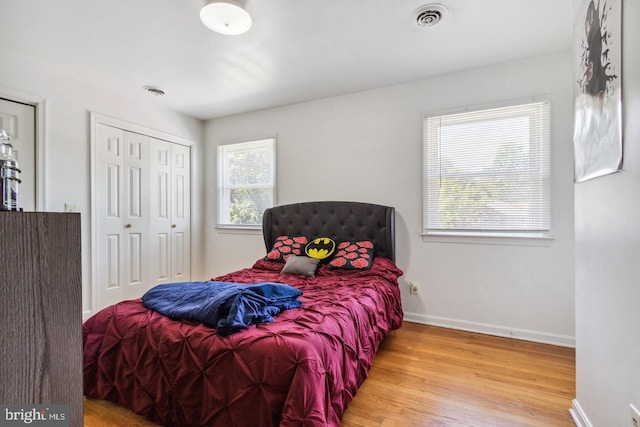 bedroom with hardwood / wood-style floors