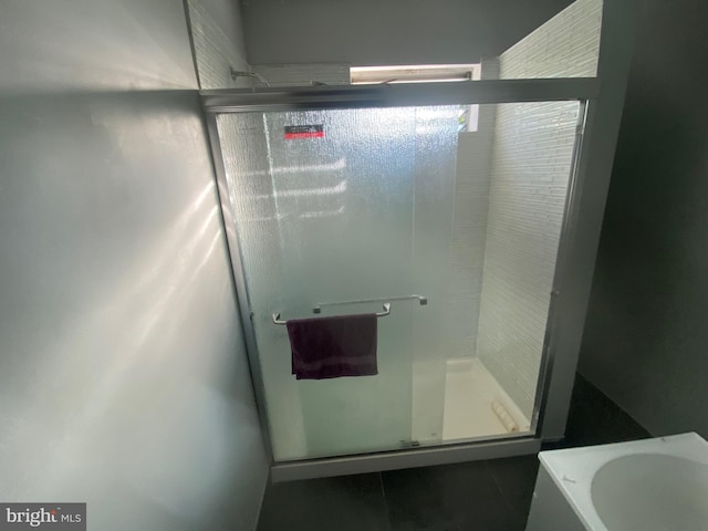 bathroom featuring walk in shower