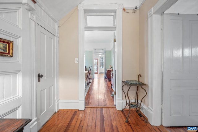 hallway featuring hardwood / wood-style flooring