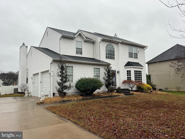 view of property with a garage