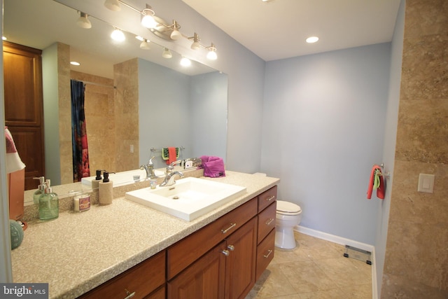 bathroom featuring a shower with shower curtain, tile patterned floors, vanity, and toilet