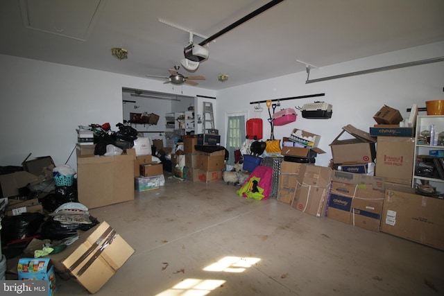 garage featuring ceiling fan and a garage door opener