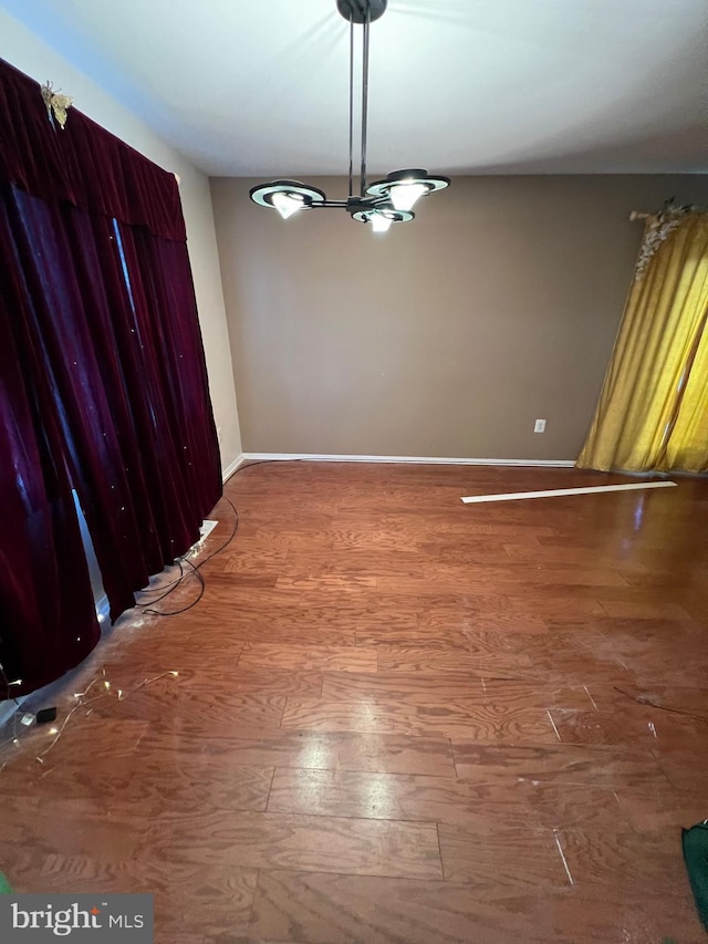 unfurnished dining area with hardwood / wood-style floors