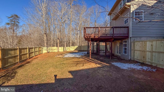 view of yard with a wooden deck