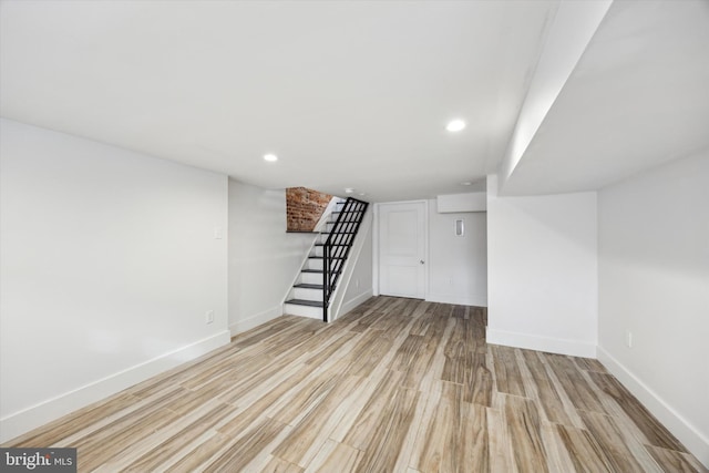 basement with light wood-type flooring