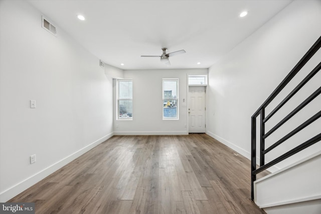 entryway featuring hardwood / wood-style flooring and ceiling fan