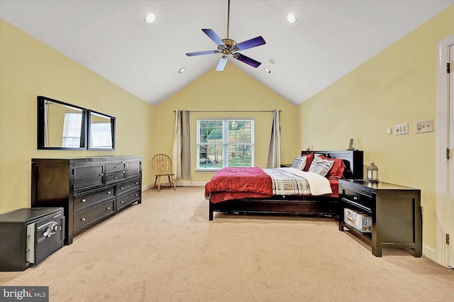 carpeted bedroom with ceiling fan and lofted ceiling