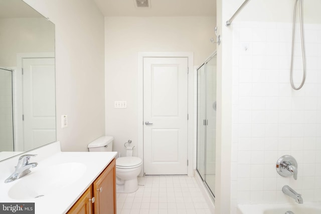 full bath featuring visible vents, toilet, enclosed tub / shower combo, tile patterned floors, and vanity