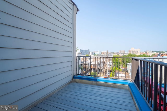 balcony featuring a view of city