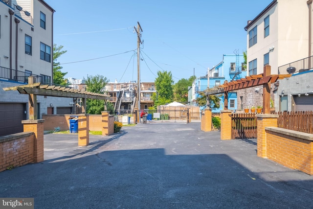 view of street featuring a gate