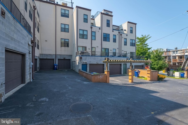 view of building exterior featuring a garage