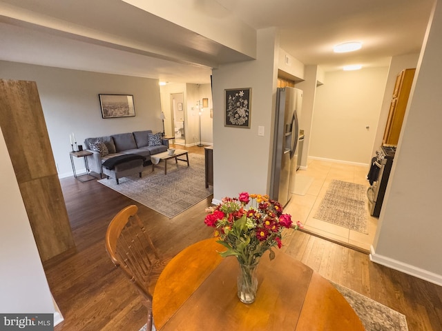 dining area featuring light wood-type flooring