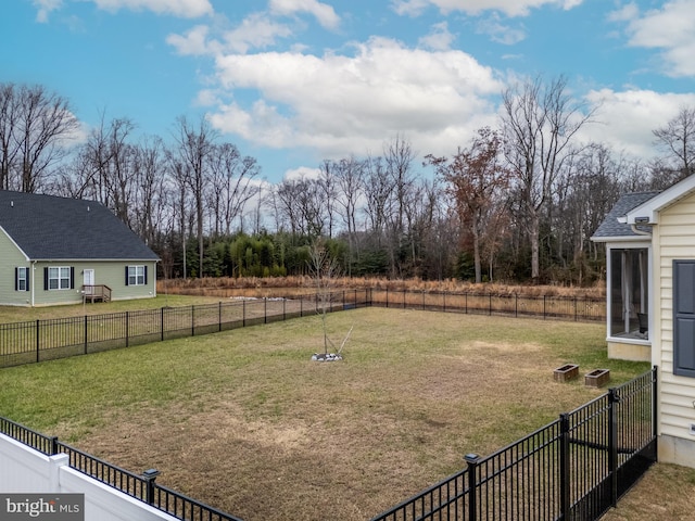 view of yard with an outdoor fire pit